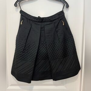Bogner Black Quilted Mini Skirt with Gold Zippers